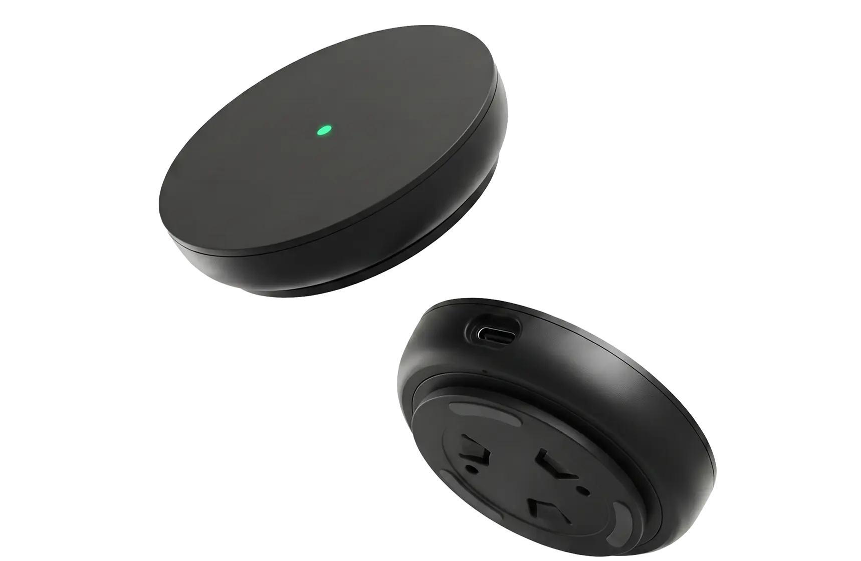 Two igloo Bridge 2 hubs: one from above, a round matte black disc with a green status light, the other flipped to show its USB-C port and mounting base