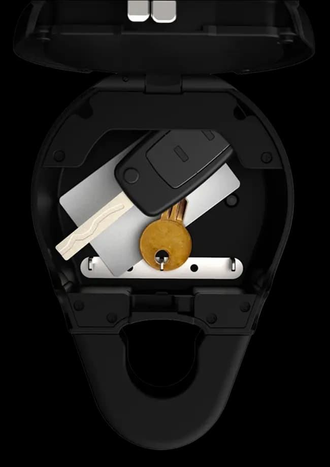 An open igloo Keybox 3 holding a car key, a house key and an access card