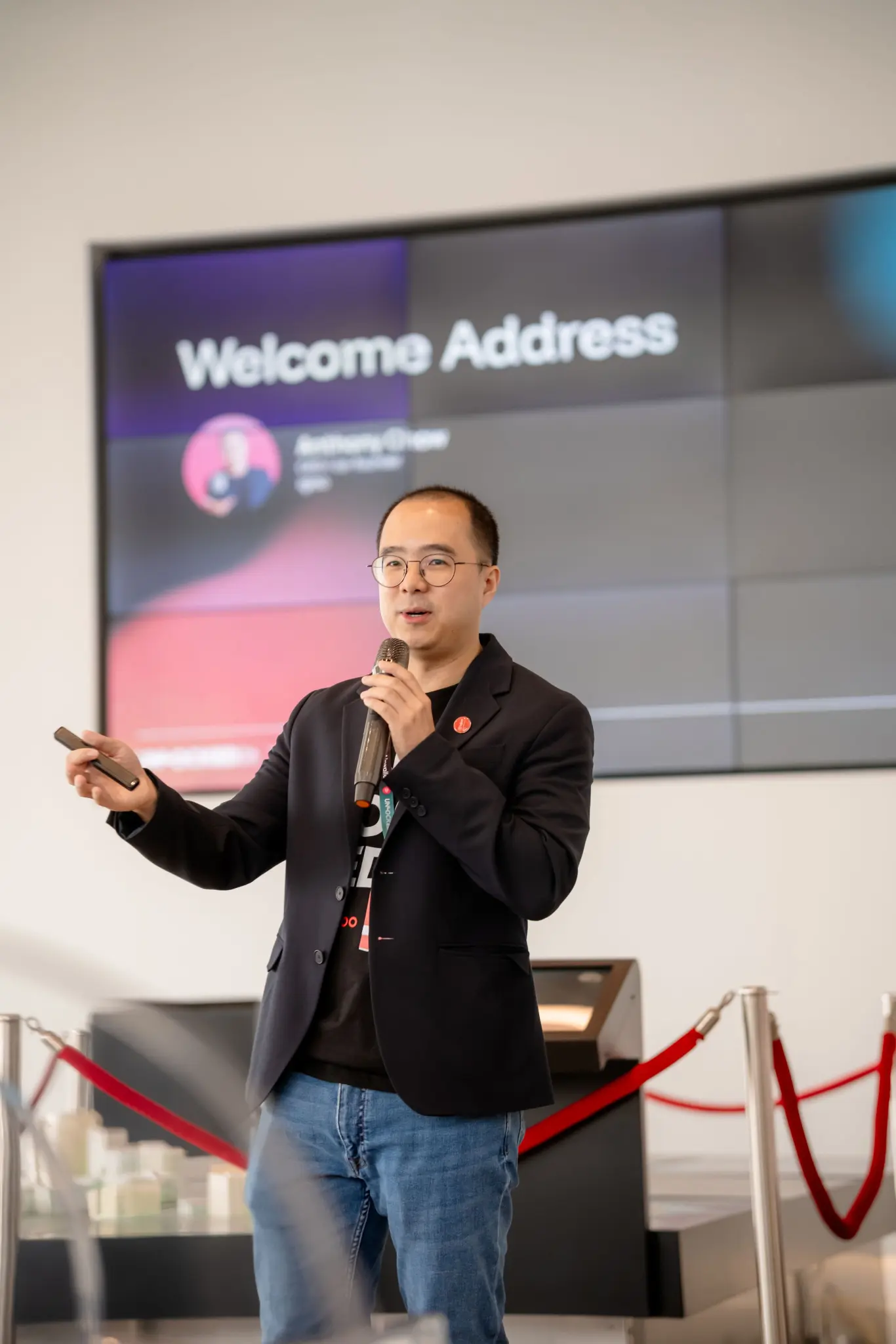 igloo co-founder Anthony Chow giving the welcome address at UNLOCKED26 Singapore