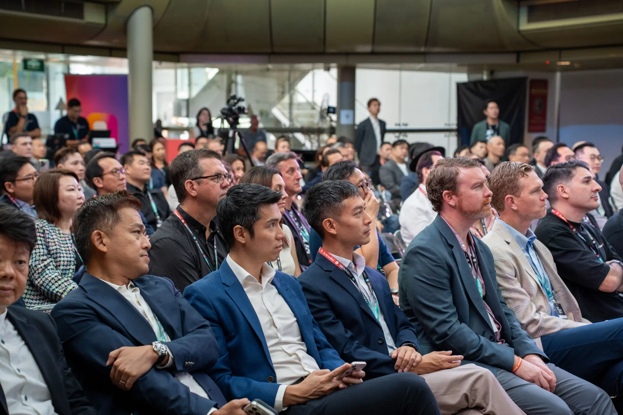 A packed audience listening to a session at UNLOCKED26 Singapore
