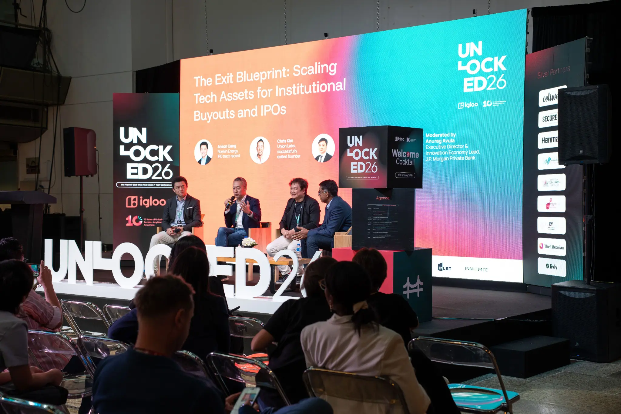 Audience watching The Exit Blueprint panel on the UNLOCKED26 main stage