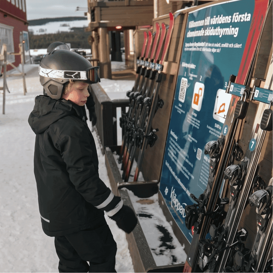 Child collecting skis from an unstaffed rental kiosk beside on-site pickup instructions