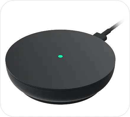 The igloo Bridge 2 on its own, a round matte black hub with a green status light and its USB-C power cable