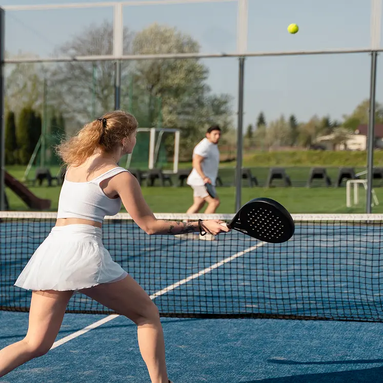 Players enjoying a game on a self-serve pickleball court